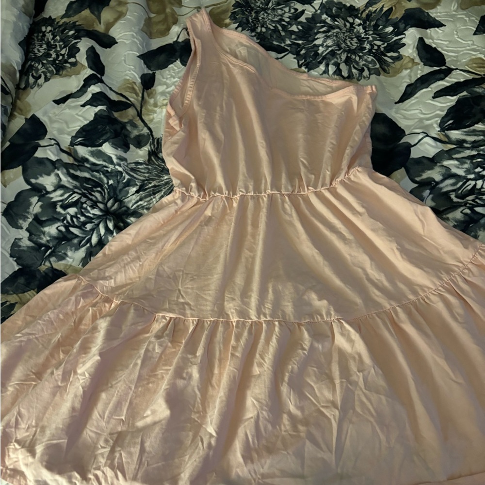 A very cute one shoulder pink dress size medium.